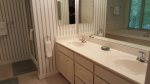 Master Bathroom with dual sinks and Walk-in shower